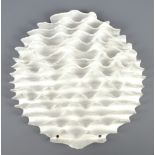 SARAH VILLENEAU (born 1958); a domed frilled stoneware wall hanging covered in satin white glaze,