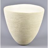 RENA MENARDI; a textured earthenware vessel covered in matt white glaze, pottery label, height 19cm.