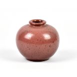 POH CHAP YEAP (1927-2007); a globular stoneware vase covered in mottled fuchsia glaze, painted