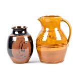 DAVID FRITH (born 1943); an early slipware jug with honey glaze, pottery label, height 26.5cm and an