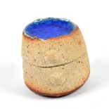 ROSEMARY WREN (1922-2013) for Oxshott Pottery; a small stoneware box with glass like blue glaze to