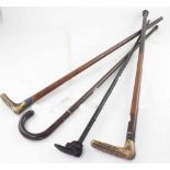 Two antler-handled malacca canes, one with rubber stopper to the end,