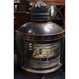 A ship's copper port lantern, modified to electricity, height 54cm.