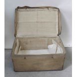 A 19th century canvas covered wicker sailors' chest with rope handles and steamer labels and with