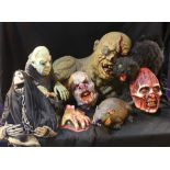 A group of horror busts and figures to include a foam and rubber mutilated monster and a rubber