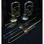 A cornet, two euphoniums and two trombones including a Vincent Bach Stradivarius Model 12 example (