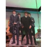 THE BEATLES; four large cardboard cutouts of the band.