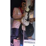 A large Elvis Presley figure with guitar in iconic outfit, height approx 185cm.