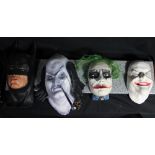 BATMAN; four masks comprising Batman, Penguin and two Jokers modelled after Heath Ledger and Jack