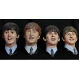 THE BEATLES; painted busts of Paul, John, George and Ringo in shirt collars and ties, height of each