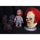 IT; a rubber mask modelled after Pennywise, height including base approx 37cm excluding wig, a