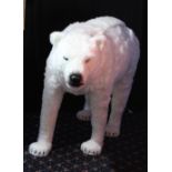 A large plush covered model Polar Bear, approx 87 x 150cm.