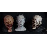 HELLRAISER; four Cenobite busts, two figures of Pinhead and the Chatterer and a model cube on stand,