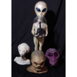 A freestanding figure of an alien holding lamp, height including base approx 100cm, a bust of an