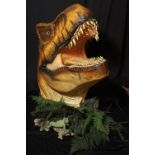 JURASSIC PARK; a large replica T-Rex dinosaur head, height approx 109cm, with two posters/signs.