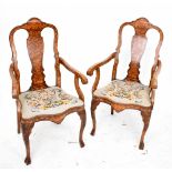A pair of late 18th/early 19th century Dutch oak and marquetry inlaid elbow chairs with serpentine