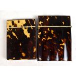 Two 19th century tortoiseshell card cases, including a rippled example, 10 x 7.5cm, and a stud