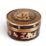 A late 18th/early 19th century tortoiseshell and yellow metal inset circular trinket box and