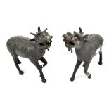 A pair of cast metal mythical beasts, height 18cm (2).Additional InformationThe horse's front left
