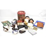 A quantity of assorted smoking related items to include vintage tobacco pipes, ceramic lidded