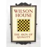 A vintage advertising enamel sign 'Wilson House, the Sign of Quality', inset within metal frame,