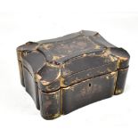 A Victorian black lacquered tea caddy with gilt and painted decoration of Oriental figures in