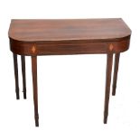 An Edwardian mahogany, inlaid and cross banded card table with replaced floral fabric playing