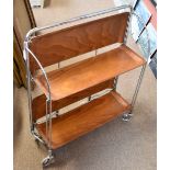 GERLINOL; a retro plywood and chrome two tier folding dinner wagon, height 75cm.