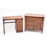 An early 20th century oak chest of drawers with central long drawer, two short and single panelled