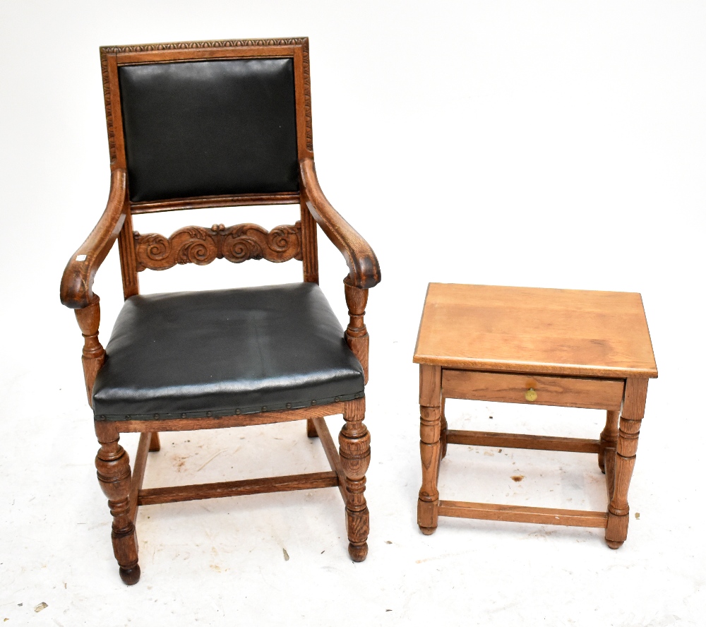An oak open arm chair and a small side table (2).
