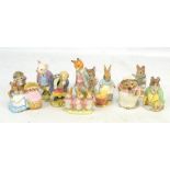 BESWICK; eleven Beatrix Potter figures including 'Mrs Tittlemouse' with gold backstamp, 'Tailor of