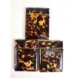 Three 19th century tortoiseshell card cases, each of typical form, with applied white metal