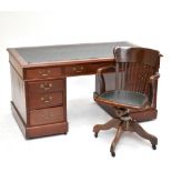 GEO. D. POOLEY; an early 20th century nine drawer pedestal desk, with maker's stamp to base of