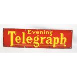 A vintage advertising enamel sign 'Evening Telegraph', 13.5 x 49cm.