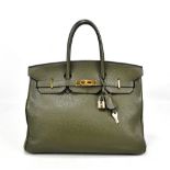 HERMÈS; a sage green 'Birkin 35' grained calf leather handbag with two top handles, gold tone