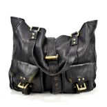 MULBERRY; a vintage large black Roxanne tote handbag decorated with gold hardware and long leather