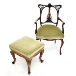 An Edwardian mahogany framed armchair on cabriole supports, also a Victorian rosewood stool (2).