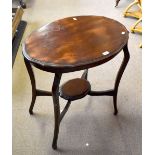 An Edwardian occasional table of oval form, length 72cm.