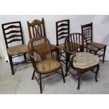 A Victorian oak hall chair, carved openwork back to turned supports,