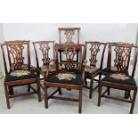 A set of eight 18th century Chippendale style dining chairs to include one carver,