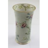 MacIntyre; a 19th century Secessionist celadon ground baluster vase with raised floral decoration,