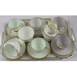 A Wedgwood mid-20th century six-setting tea set, three cups,