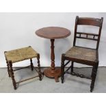 An early 20th century kitchen chair with rush seat,