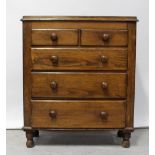 A Victorian scumble pine chest of two-over-three drawers, on turned legs, height 105cm.