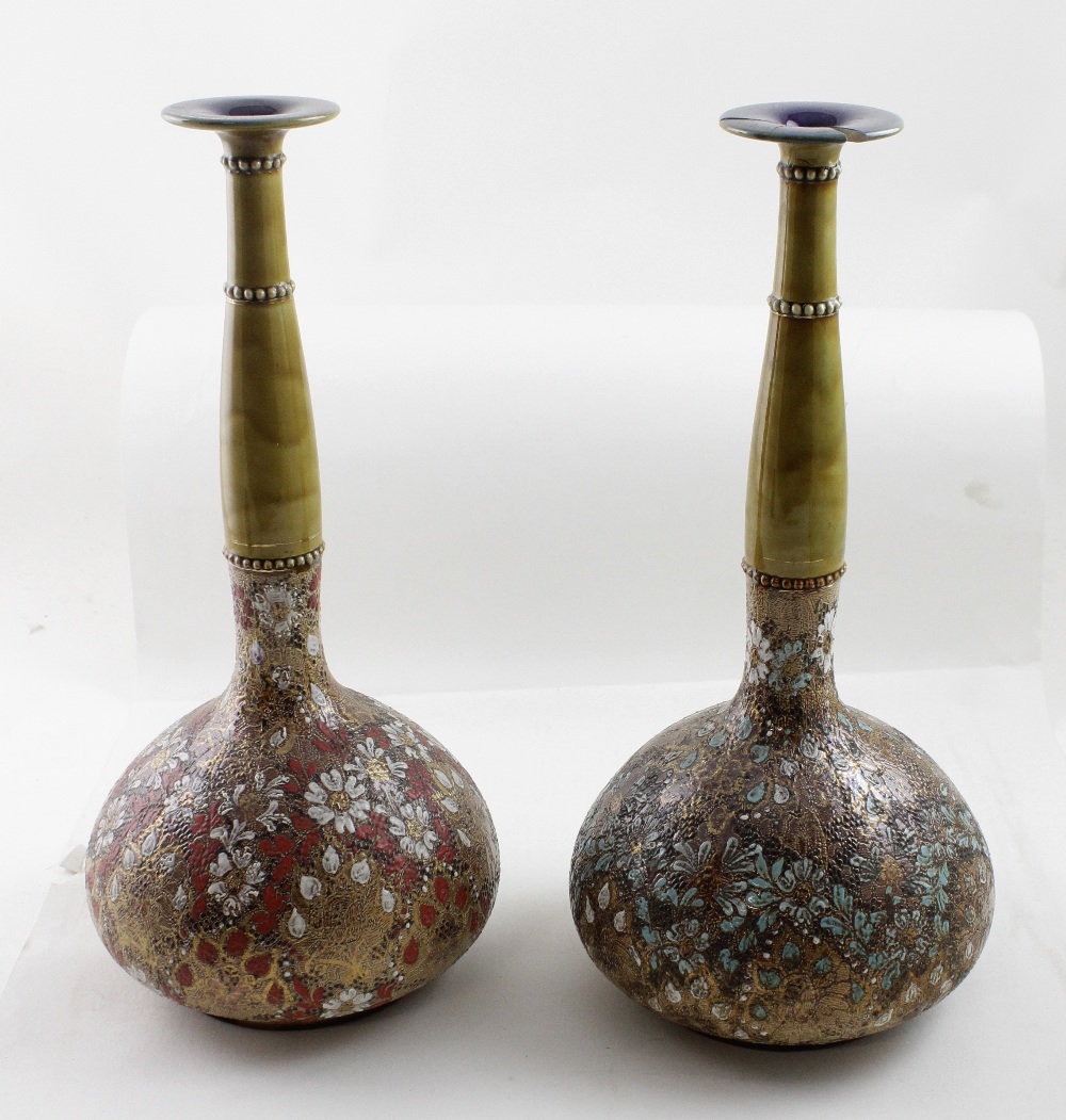 Royal Doulton; a pair of Doulton Lambeth lace vases (one af ) (2).