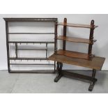 An early 20th century oak wall-hanging rack for cups and plates,