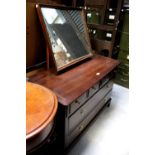 A Stag-style four-over-two drawer dressing chest with swing mirror, width 107cm.