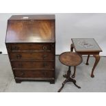 A walnut veneered bureau of four drawers, height 94cm,