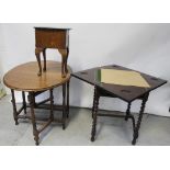 An Edwardian four-sectional envelope card table on wrythen supports,