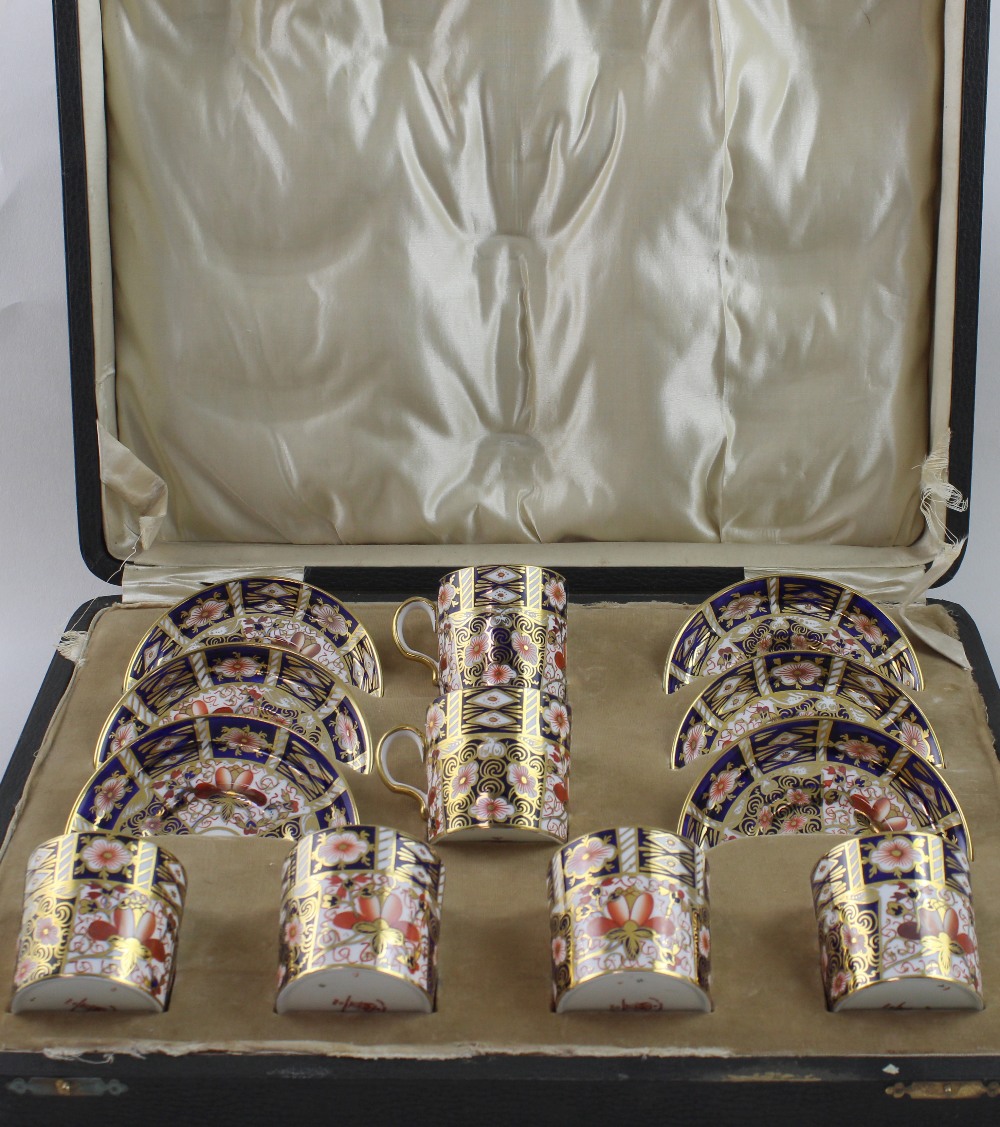 A cased set of six Royal Crown Derby Imari pattern coffee cans and saucers,